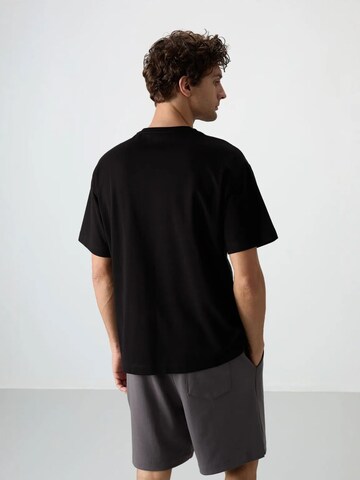 Tommy Life T-Shirts in Schwarz