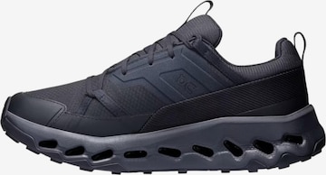 Chaussure de sport On Running en noir : devant