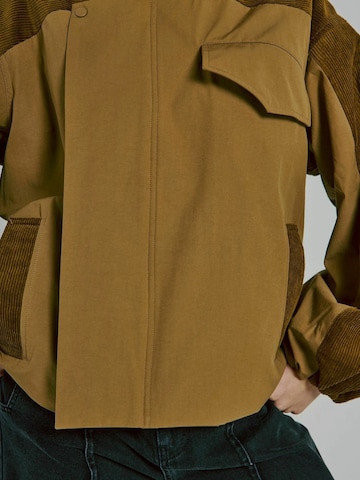 Veste mi-saison 'Canna' NORR en vert