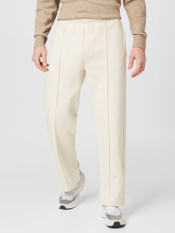 WEEKDAY Loose fit Trousers in Beige: front