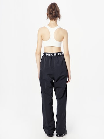 juoda Nike Sportswear Laisvas Kelnės 'Air'