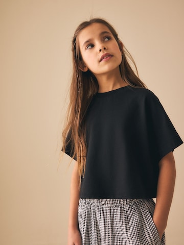 T-Shirt Next en noir