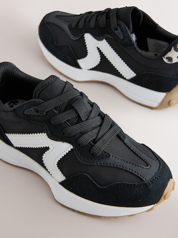 Baskets Next en noir