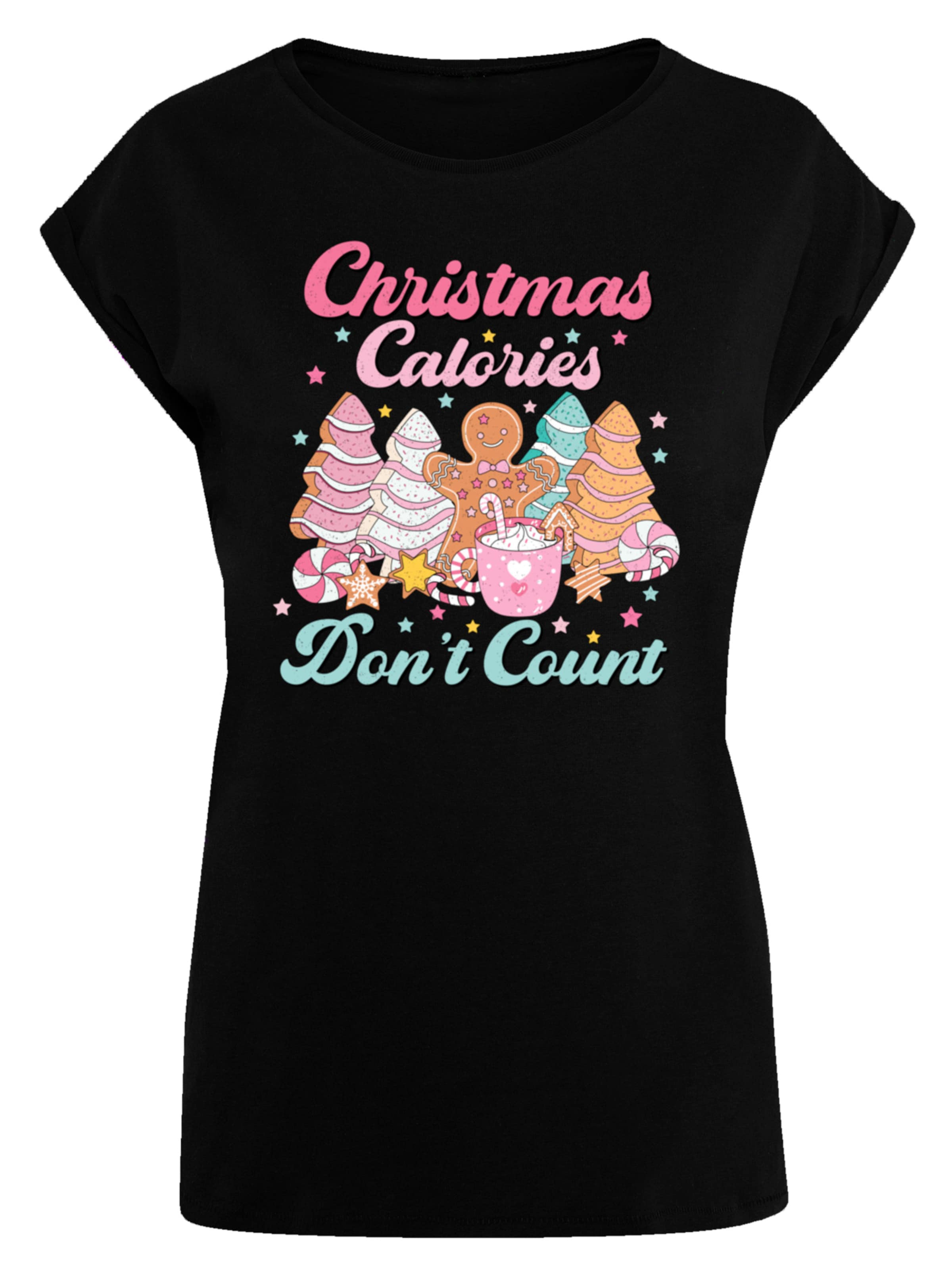 F4NT4STIC Shirt 'Christmas Calories Dont Count Candy' in Zwart: voorkant