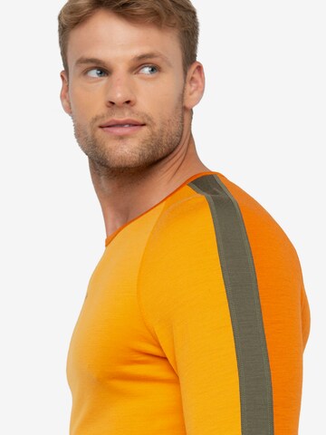 ICEBREAKER T-shirt i orange