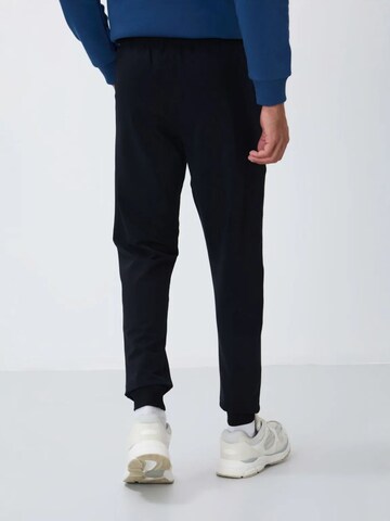 Regular Pantalon Tommy Life en noir