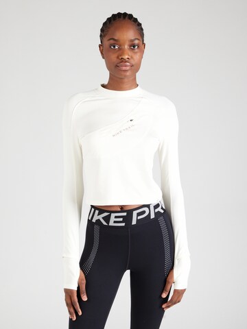 NIKE Funktionstopp i beige: framsida