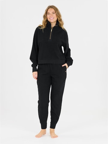 Regular Pantalon de sport 'Hecey' Athlecia en noir