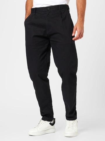 Calvin Klein Regular Pleat-Front Pants in Black: front