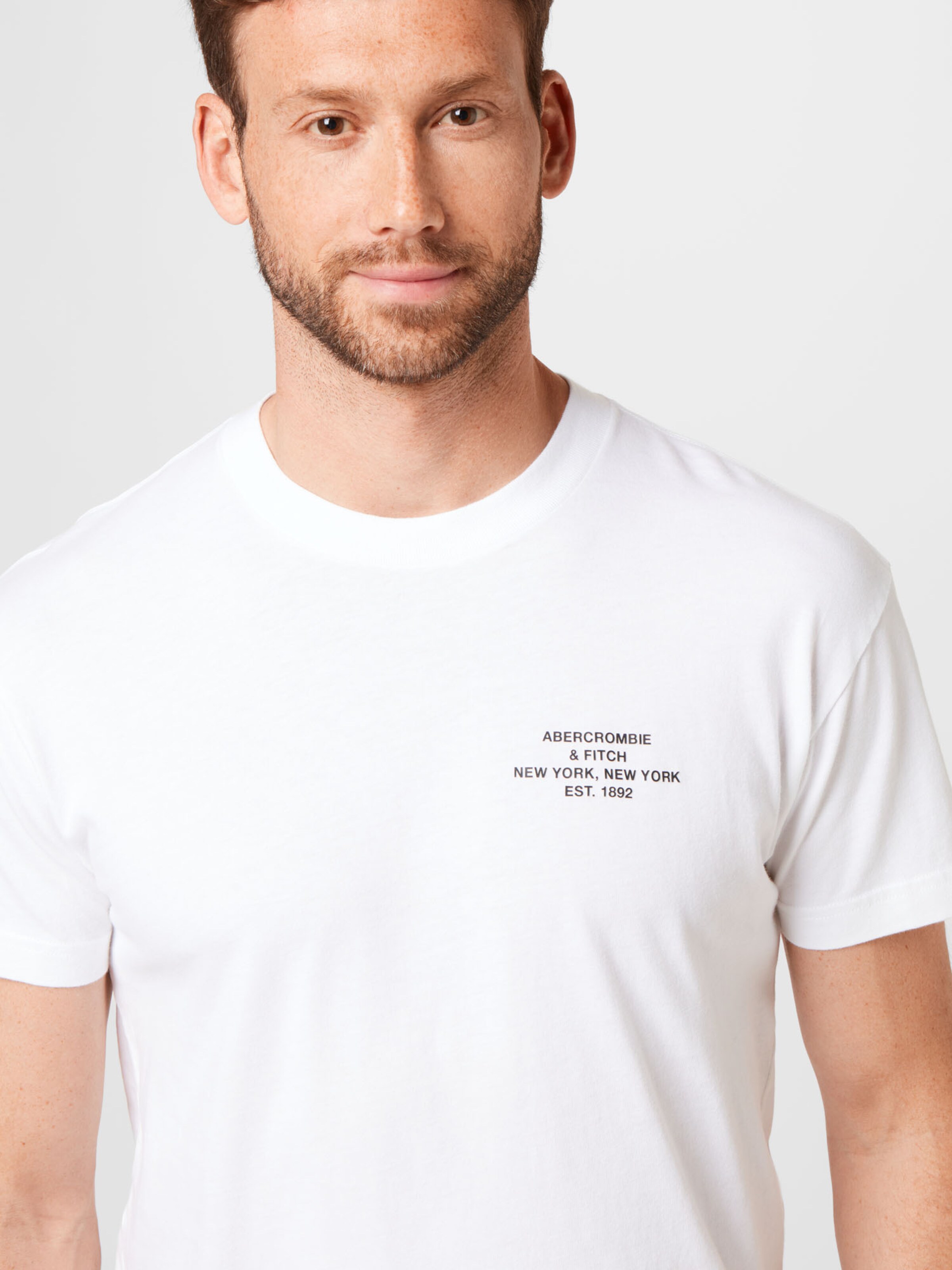 Männer Shirts Abercrombie & Fitch T-Shirt in Weiß - FW04063