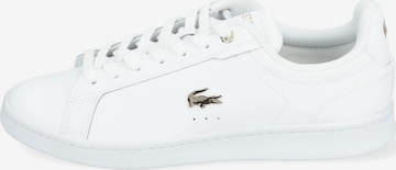 Baskets basses LACOSTE en blanc