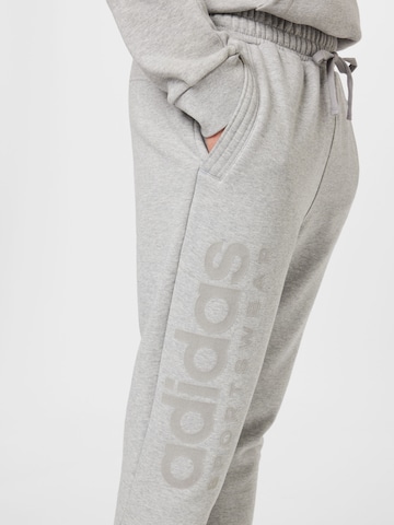 ADIDAS SPORTSWEAR Ozke Športne hlače 'Lounge Fleece' | siva barva