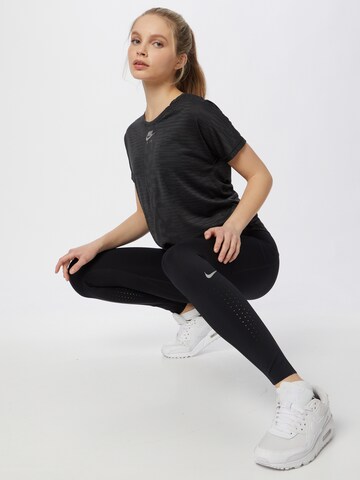NIKE Kitsas Spordipüksid 'Epic Luxe', värv must
