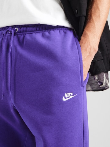 Nike Sportswear Tapered Housut 'CLUB' värissä lila
