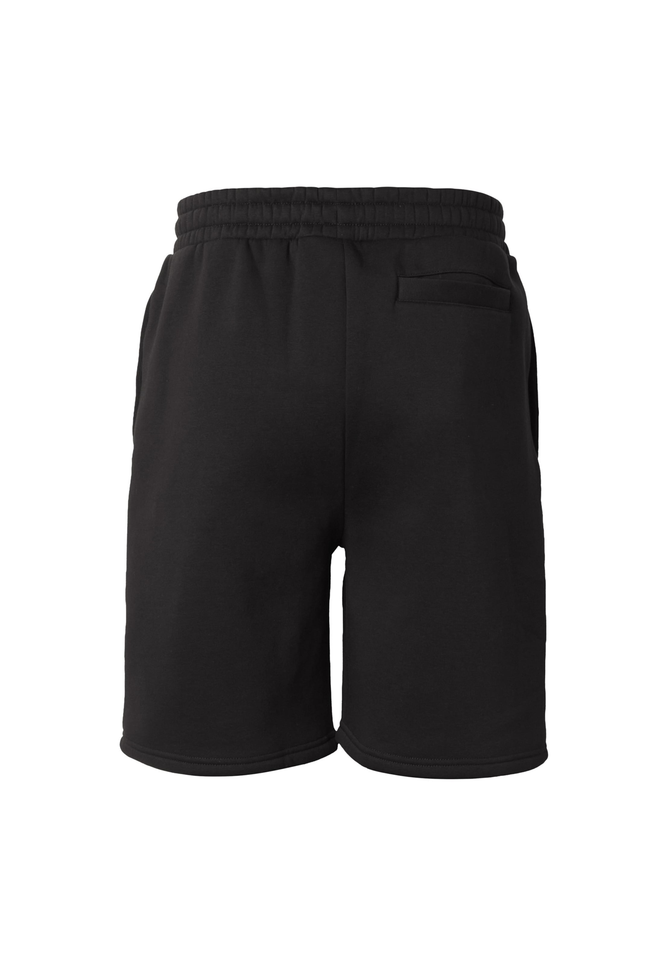 Karl Kani Regular Trousers in Black