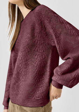 Pullover di QS in rosso: lato