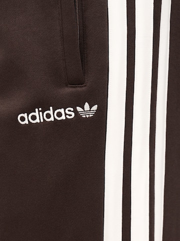 Loosefit Pantaloni 'MUC' di ADIDAS ORIGINALS in marrone