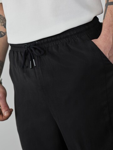 DAN FOX APPAREL - regular Pantalón 'Miguel' en negro