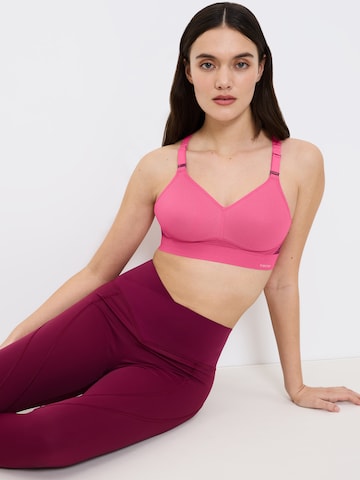 Triumph Triaction T-shirt Sports bra ' Triaction Hybrid Lite ' in Pink