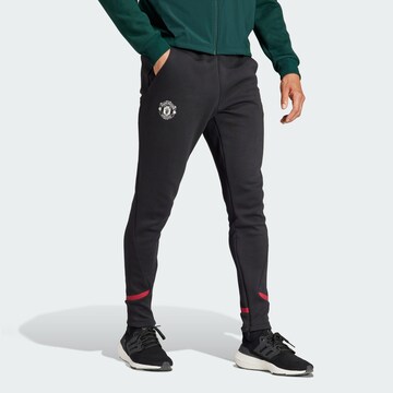 ADIDAS SPORTSWEAR Tapered Workout Pants 'Manchester United Designed for Gameday' in Black: front