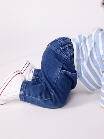 PETIT BATEAU Zwężany krój Jeansy w kolorze niebieski