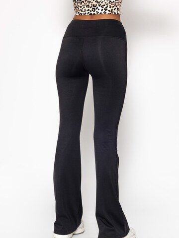 SASSYCLASSY Flared Pants in Black