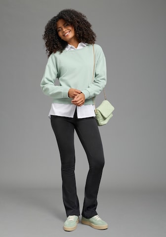 ARIZONA Flared Jeggings in Black: front