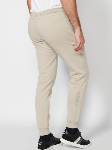 Tapered Pantaloni di KOROSHI in beige