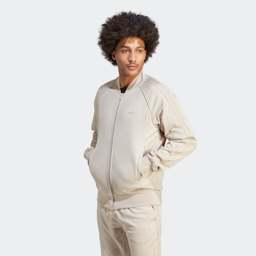 Veste de survêtement 'Graphics Monogram Sst' ADIDAS ORIGINALS en beige : devant