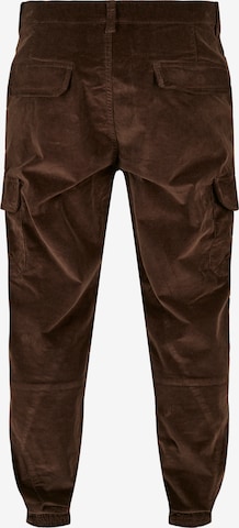 Urban Classics Loose fit Cargo trousers in Green