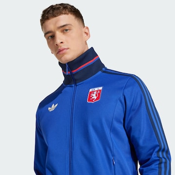 Veste de survêtement 'Olympique Lyon Anniversary' ADIDAS ORIGINALS en bleu