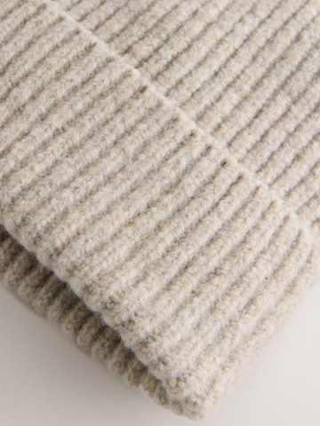 Bonnet Next en beige