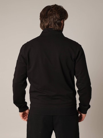 Veste de survêtement 'FLASH' Deeluxe en noir