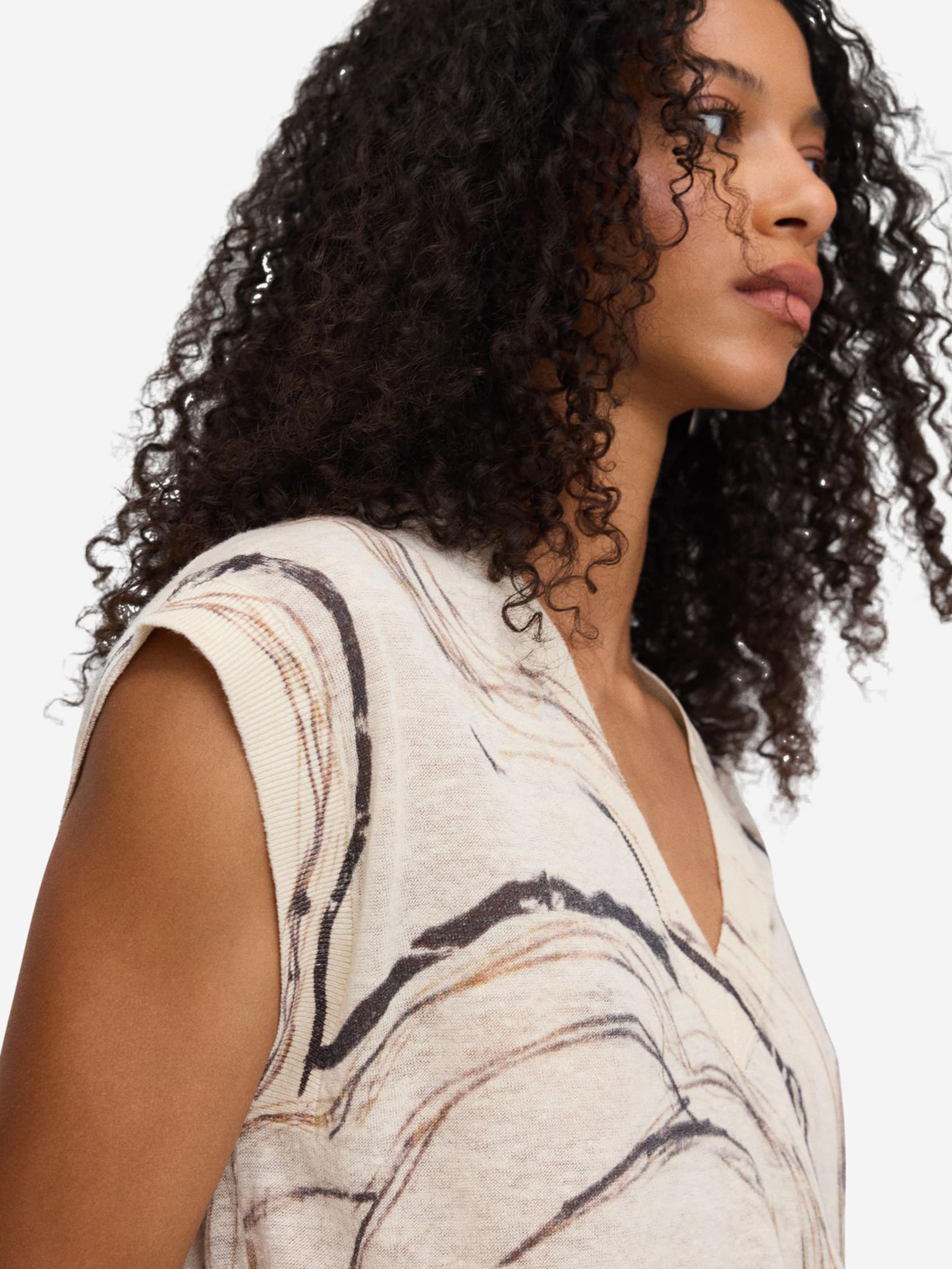 Gilet di Adolfo Dominguez in beige