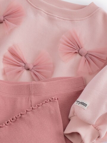 Set Next en rose