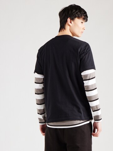 new balance T-Shirt in Schwarz