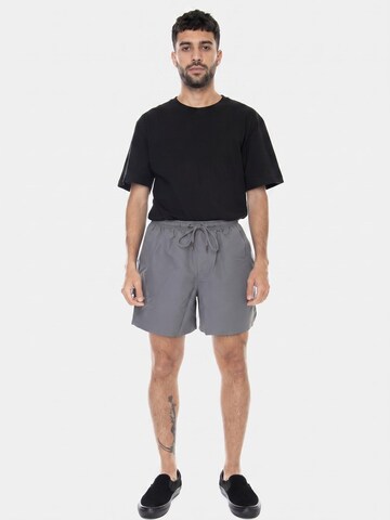 Baggy Pantaloni 'Mens Mirage Mox EB Shorts' di PUMA in grigio