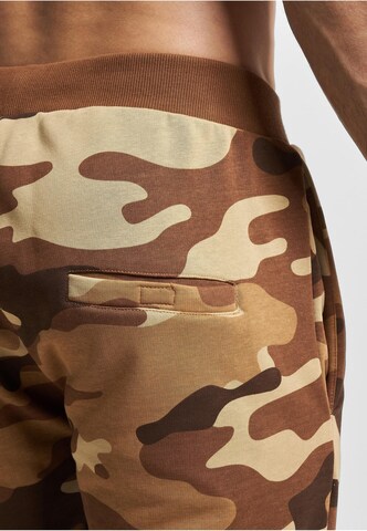 Tapered Pantaloni di Ecko Unlimited in marrone