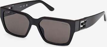 Lunettes de soleil GUESS en noir : devant