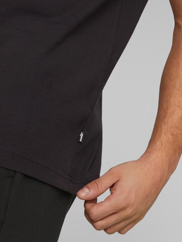 PUMA - Camiseta funcional 'Essentials' en negro