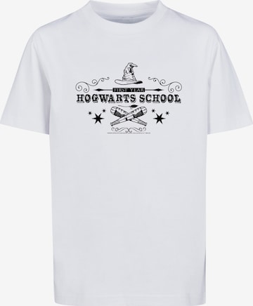 F4NT4STIC T-Shirt 'Harry Potter Hogwarts First Year' in Weiß: predná strana