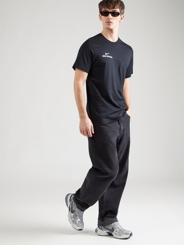 Nike Sportswear - Camiseta 'OFFICIAL' en negro