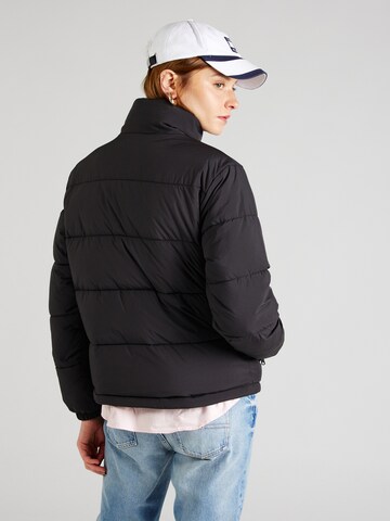 Veste mi-saison 'Essential' Tommy Jeans en noir