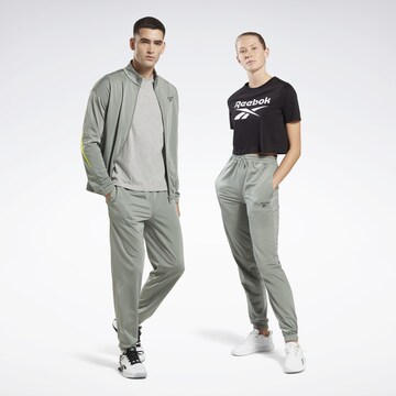 Tapered Pantaloni sportivi di Reebok in verde