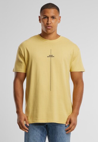 Merchcode Shirt 'Think Different' in Yellow: front