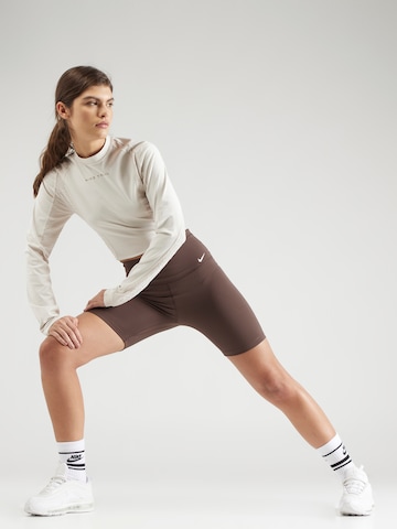 NIKE Skinny Sportovní kalhoty 'ONE' – hnědá