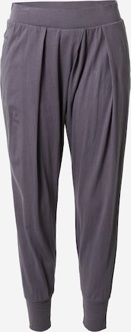 CURARE Yogawear Zúžený Sportovní kalhoty – fialová: přední strana