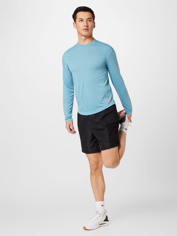 T-Shirt fonctionnel 'RUN ANYWHERE' UNDER ARMOUR en bleu