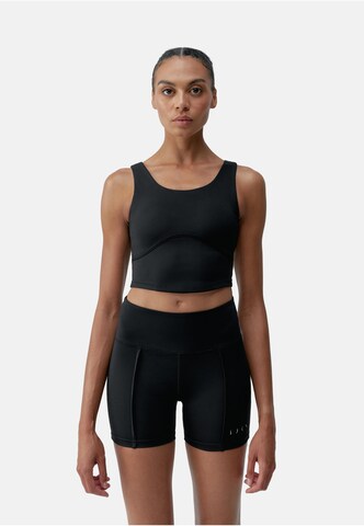 Haut de sport 'Sayani' Born Living Yoga en noir : devant