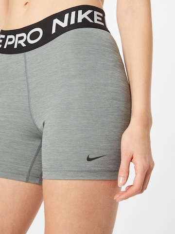 Skinny Pantalon de sport 'Pro 365' NIKE en gris